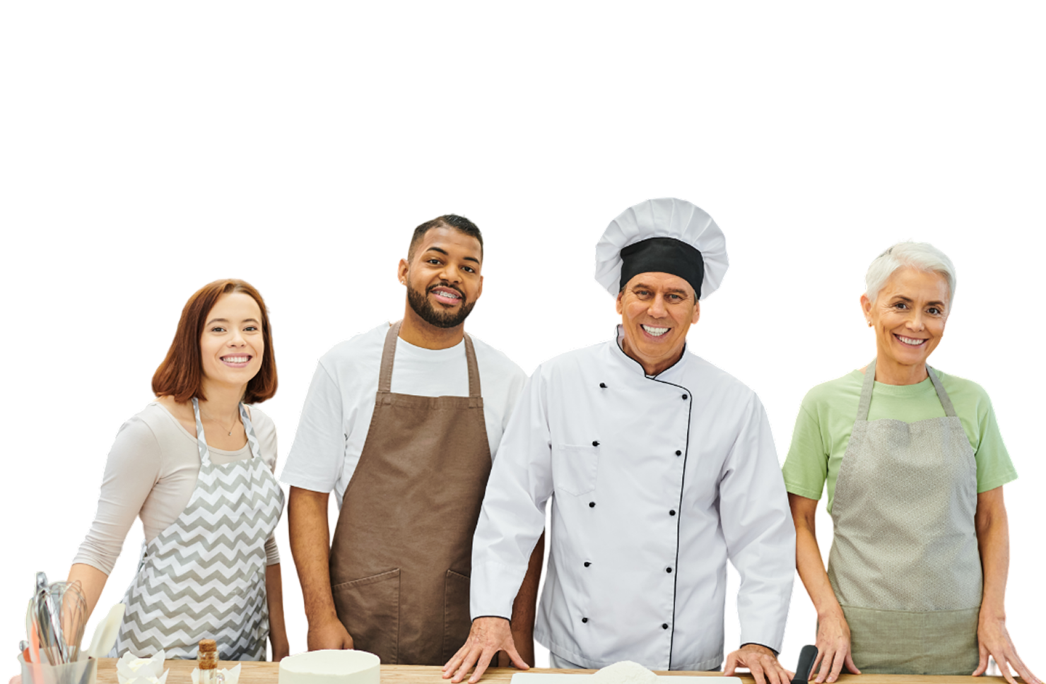 Cuatro cocineros sonriendo